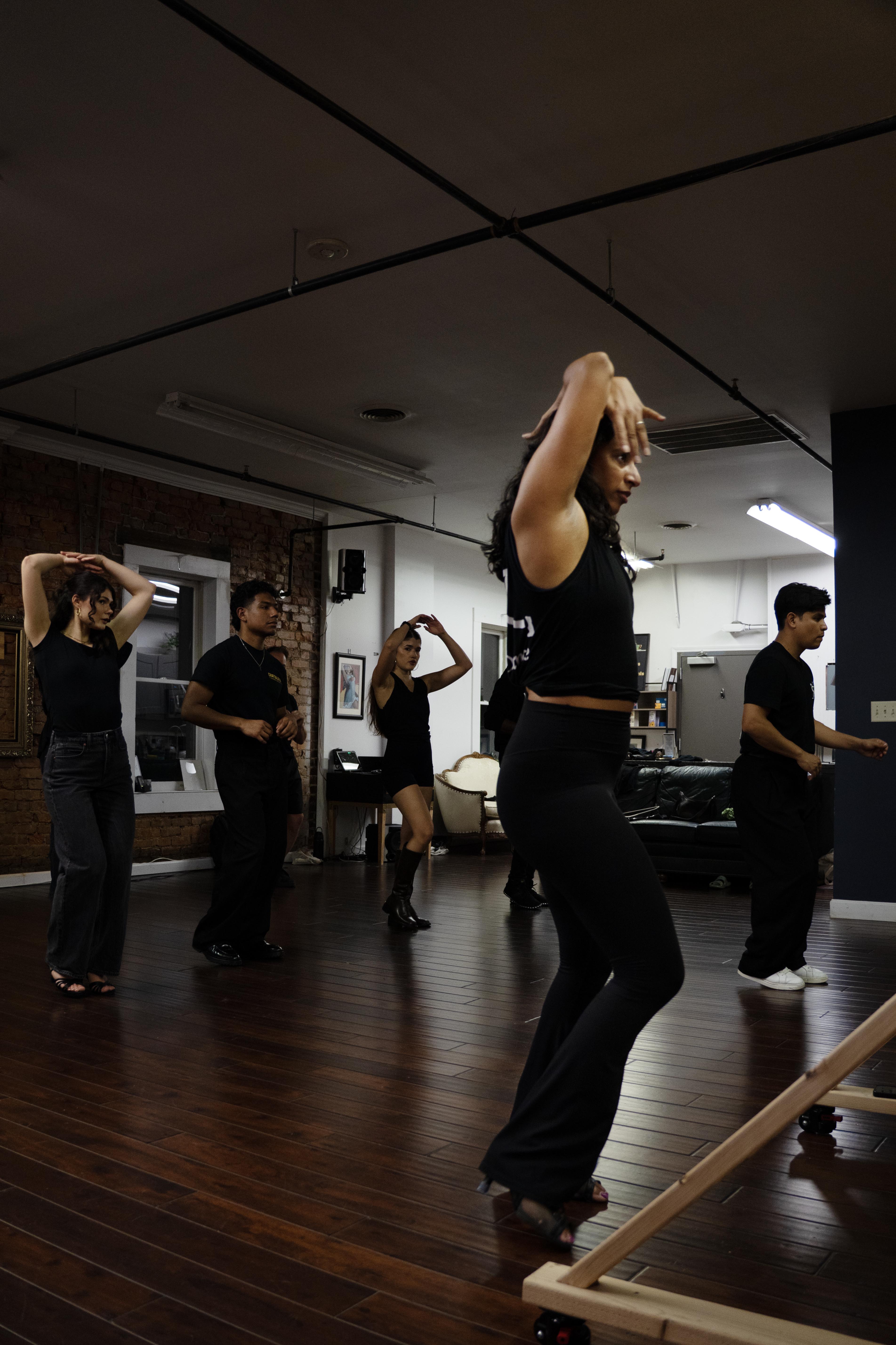 People enjoying a salsa and bachata dance class
